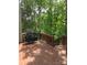 Wooden deck with stairs and a grill at 1253 Iverleigh Trl, Charlotte, NC 28270