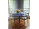 Dining area with a table and four chairs near the window at 1253 Iverleigh Trl, Charlotte, NC 28270