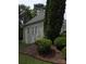 This house features a neutral exterior with a well-maintained lawn and mature landscaping at 1253 Iverleigh Trl, Charlotte, NC 28270