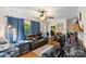 Cozy living room featuring hardwood floors, ample natural light, and comfortable seating at 1315 Cortland E Rd, Charlotte, NC 28209
