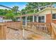 Wooden deck featuring railings and access to the home and backyard, ideal for outdoor relaxation and entertaining at 1405 8Th Nw Ave, Conover, NC 28613