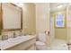 Bright bathroom with vanity, sink, toilet, and shower area offering practical design and functionality at 1405 8Th Nw Ave, Conover, NC 28613