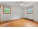 Bright bedroom featuring hardwood floors, fresh paint, and natural light through the window at 1405 8Th Nw Ave, Conover, NC 28613