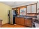 Traditional kitchen features wood cabinets, stainless steel appliances, and mosaic tile backsplash at 1405 8Th Nw Ave, Conover, NC 28613