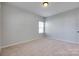 Cozy bedroom with a window and neutral color palette, offering a serene space at 1412 Afternoon Sun Rd, Matthews, NC 28104