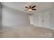 Bedroom with neutral walls, carpet, and a closet with double doors for maximum storage at 1412 Afternoon Sun Rd, Matthews, NC 28104