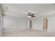 Spacious bedroom with carpet floors, neutral wall color, and ceiling fan at 1412 Afternoon Sun Rd, Matthews, NC 28104
