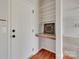 Entryway showcasing a door, built-in shelves, granite countertop, and hardwood floors at 1412 Afternoon Sun Rd, Matthews, NC 28104