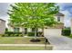 Attractive two-story home featuring a welcoming front porch and mature landscaping at 1412 Afternoon Sun Rd, Matthews, NC 28104