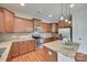 Charming kitchen featuring a tiled backsplash, stainless steel appliances, granite countertops, and an island at 1412 Afternoon Sun Rd, Matthews, NC 28104
