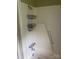 Bathroom showcasing a shower and grab bar at 1418 Old Wilkesboro Rd, Salisbury, NC 28144