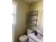 Functional bathroom space featuring a classic toilet and convenient shelving at 1418 Old Wilkesboro Rd, Salisbury, NC 28144