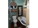 Bathroom showcasing a clawfoot tub, mosaic mirror and decorative shelving at 1418 Old Wilkesboro Rd, Salisbury, NC 28144