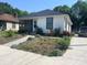 Charming single-story home with a screened-in porch and walkway at 1418 Old Wilkesboro Rd, Salisbury, NC 28144