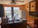 Bright kitchen area featuring a double sink, cabinets and natural light at 1418 Old Wilkesboro Rd, Salisbury, NC 28144
