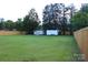 Spacious, fenced backyard with shed and trailer parking at 1421 Thompson Ave, Charlotte, NC 28216
