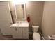 Updated bathroom with sleek vanity, modern faucet, and neutral paint creates a clean and inviting space at 1421 Thompson Ave, Charlotte, NC 28216