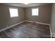 Bright and inviting bedroom with ample natural light, providing a serene retreat at 1421 Thompson Ave, Charlotte, NC 28216