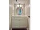 Updated bathroom featuring a modern vanity, stylish mirror, and neutral color palette at 14211 Harlequin Dr, Charlotte, NC 28273