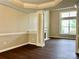 Open floor plan featuring a fireplace and view to an additional room at 14211 Harlequin Dr, Charlotte, NC 28273