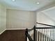 Cozy loft space with hardwood floors, neutral walls, and natural lighting at 14211 Harlequin Dr, Charlotte, NC 28273