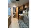 Interior view showcasing a functional kitchen, bathroom, and comfortable seating area at 146 Larboard Trl, Mount Gilead, NC 27306