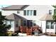 The rear exterior features a wooden deck with grill, offering an outdoor space for relaxation and entertainment at 14615 Bridle Trace Ln, Pineville, NC 28134