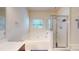 Bathroom featuring a soaking tub, glass shower, and neutral finishes at 14615 Bridle Trace Ln, Pineville, NC 28134
