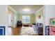 A cozy living room with a comfortable sofa and chair, showcasing a warm and inviting atmosphere at 14615 Bridle Trace Ln, Pineville, NC 28134