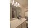 Contemporary bathroom features modern fixtures, vanity, and shower with striped curtain at 14806 Tamarack Dr, Charlotte, NC 28278