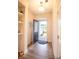 Home foyer featuring hardwood floors and interior view of neighborhood at 14806 Tamarack Dr, Charlotte, NC 28278