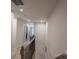 Hallway with carpet and wood railing at 14806 Tamarack Dr, Charlotte, NC 28278