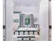 Bright bathroom showcases a tiled tub and large window, offering natural light at 150 8Th Ave, New London, NC 28127