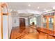 Dining room boasts hardwood floors, large windows, and custom display cabinet at 150 8Th Ave, New London, NC 28127