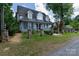 Charming home with beautiful curb appeal, a large covered porch and stone columns at 150 8Th Ave, New London, NC 28127