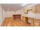 This versatile space features wood laminate floors, recessed lights, and built-in cabinets at 150 8Th Ave, New London, NC 28127