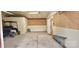 Spacious two car garage with a golf cart and side entrance at 150 8Th Ave, New London, NC 28127