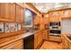 A beautifully designed kitchen with custom wood cabinets and modern appliances at 150 8Th Ave, New London, NC 28127