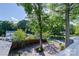 Scenic street view with trees at 150 8Th Ave, New London, NC 28127