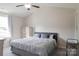 Cozy bedroom featuring neutral walls, soft carpet, ceiling fan, and a comfortable queen size bed at 1518 Glenbar Ct, Clover, SC 29710