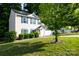 Charming two-story home with a two car garage, solar panels, and a well-manicured front lawn at 1518 Glenbar Ct, Clover, SC 29710