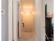 Hallway view with carpeted stairs and a hanging light fixture at 1518 Glenbar Ct, Clover, SC 29710