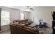 Open concept living room featuring hardwood floors, a ceiling fan, and comfortable seating at 1518 Glenbar Ct, Clover, SC 29710
