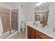 Bathroom features a walk-in shower and double sinks at 1530 S Church St # K, Charlotte, NC 28203