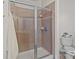 Bathroom features a glass shower door at 1530 S Church St # K, Charlotte, NC 28203
