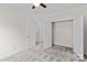 Bedroom featuring neutral walls, plush carpet, closet, and a ceiling fan at 1530 S Church St # K, Charlotte, NC 28203