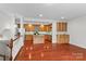 Modern kitchen with hardwood floors, stainless steel appliances, and granite countertops at 1530 S Church St # K, Charlotte, NC 28203