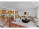Staged open living space with hardwood floors, island kitchen, and contemporary furnishings at 1530 S Church St # K, Charlotte, NC 28203