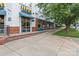 Restaurant exterior on sidewalk, featuring outdoor seating, awnings and shade trees at 1530 S Church St # K, Charlotte, NC 28203