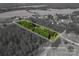 Aerial view of a verdant property with a large lot highlighted by approximate lot lines at 1575 Lewis Farm Rd, Kings Mountain, NC 28086